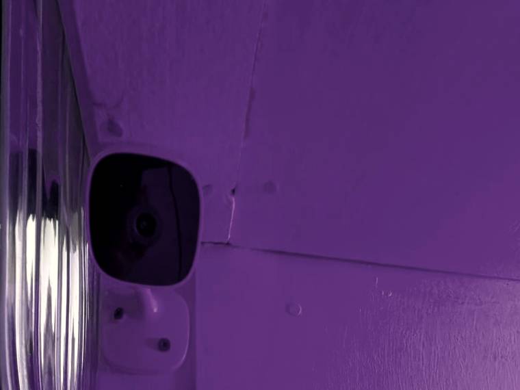 Wall-mounted camera inside the private nook suite